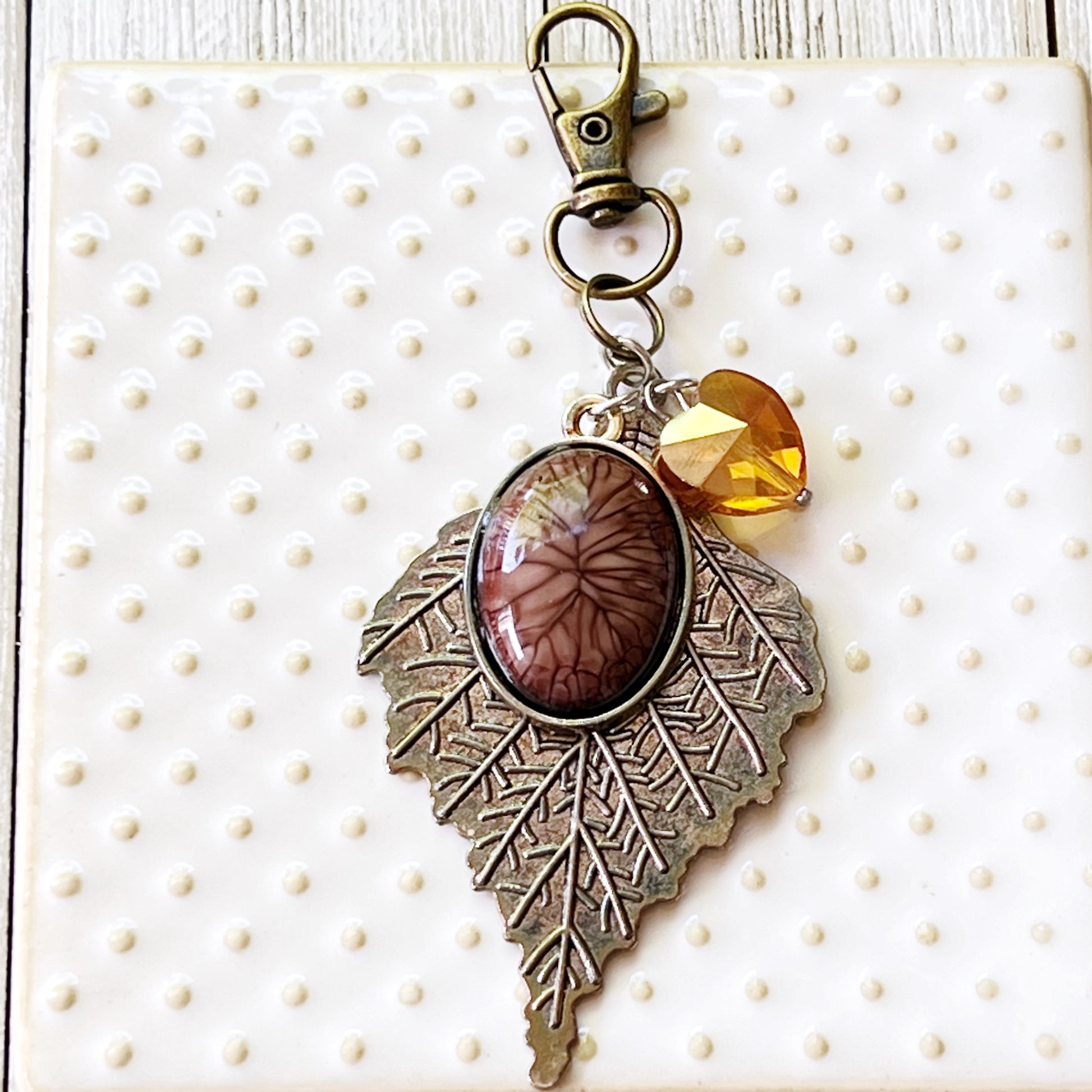 Leaf Purse Charm – Bronze Botanical Keychain with Glass Heart Accent