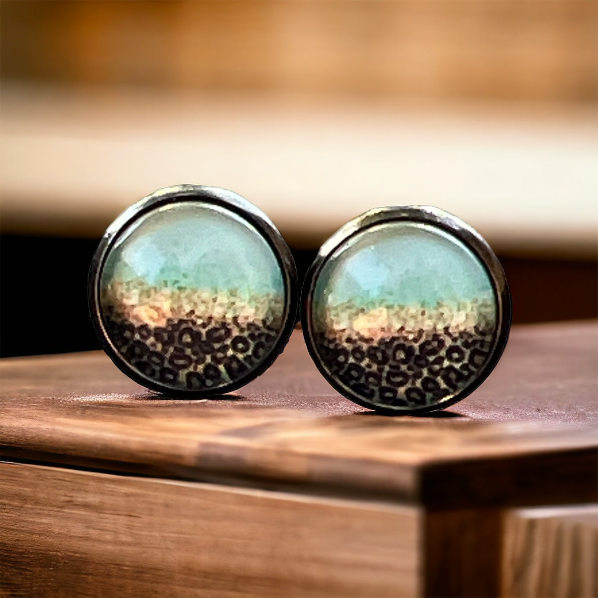 Mint Leopard Ombre Stud Earrings – Bold Boho Jewelry on a wooden display 
