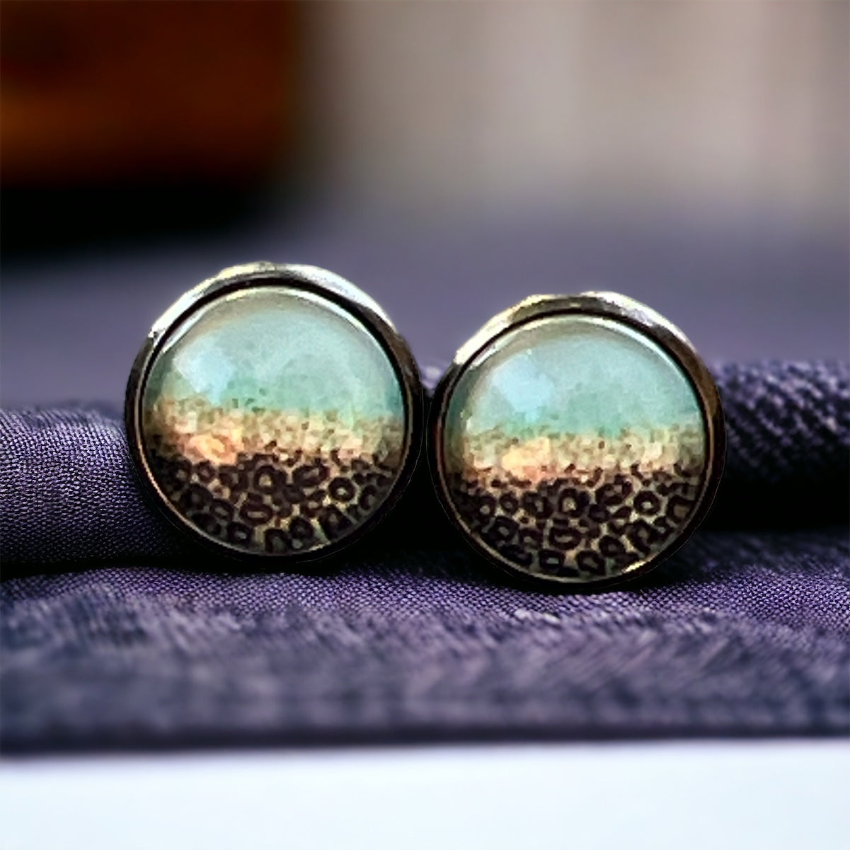 Mint ombre stud earrings with leopard print detail in a dark metal setting