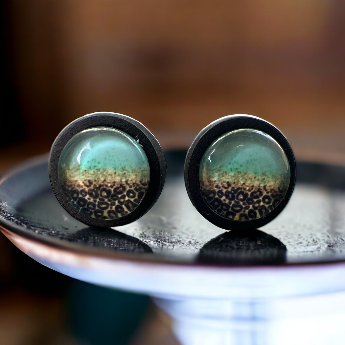 Green Leopard Fade Resin Stud Earrings – Boho Jewelry on plate