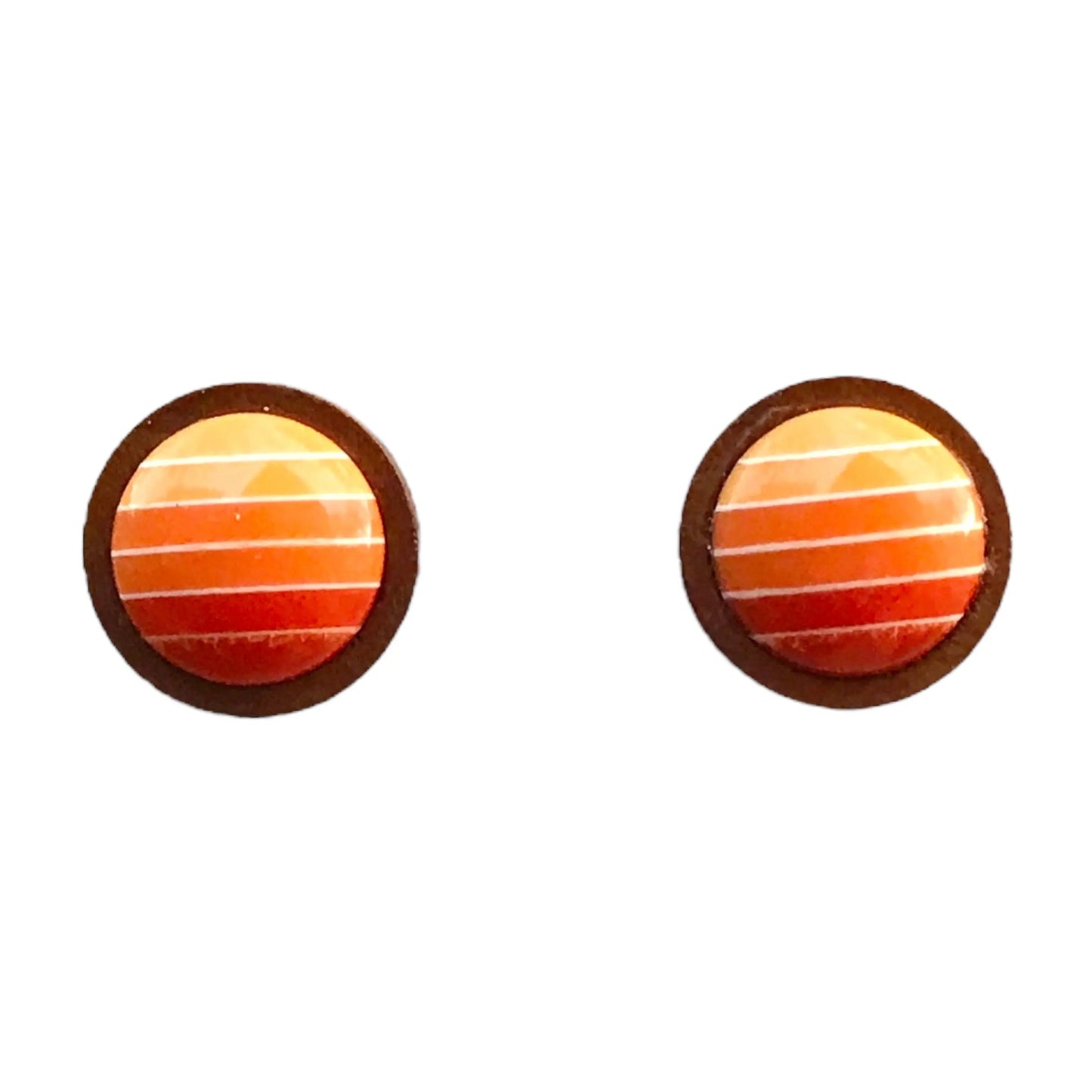Round orange gradient striped wood stud earrings displayed on a White background 