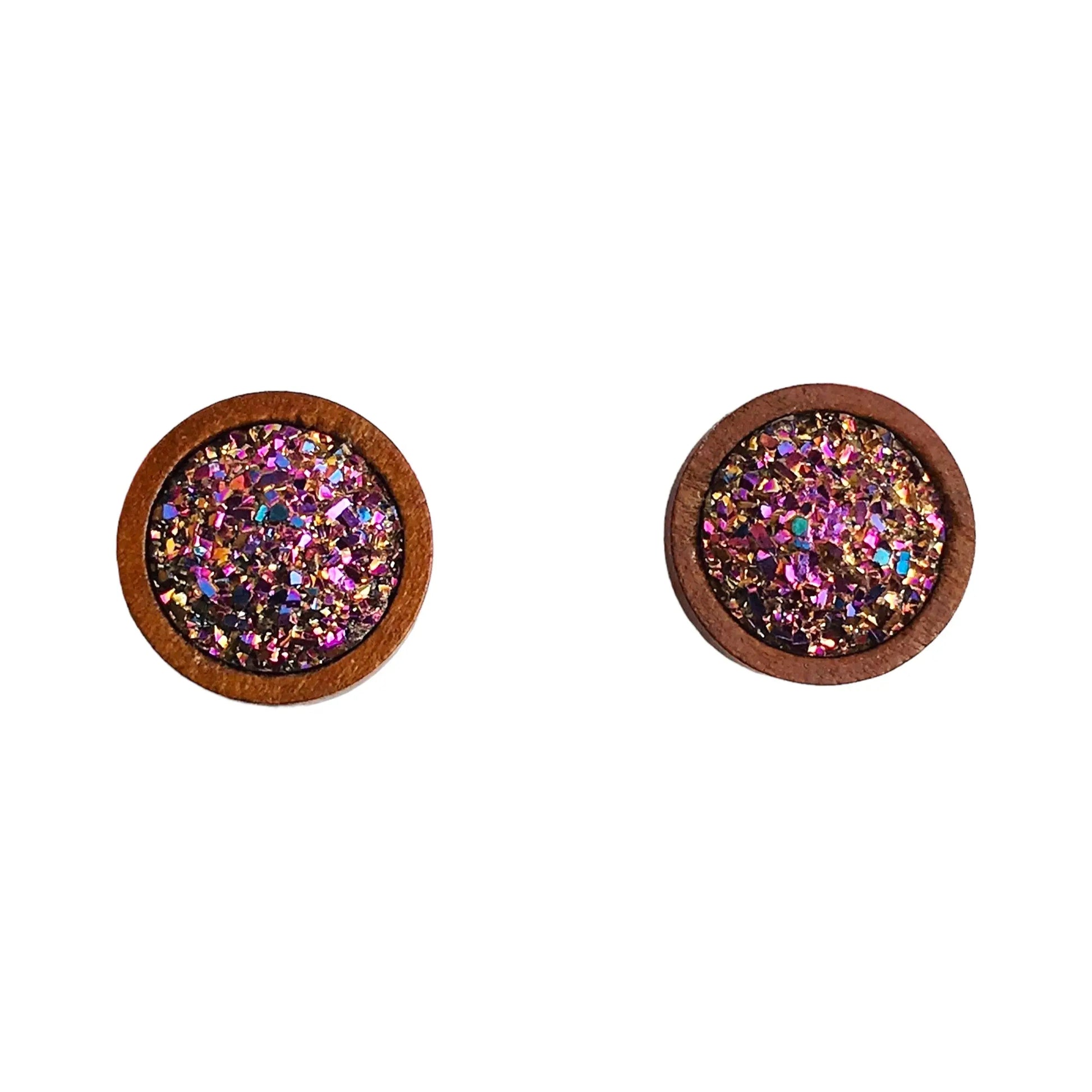 Round pink glitter druzy wood stud earrings on a white background 
