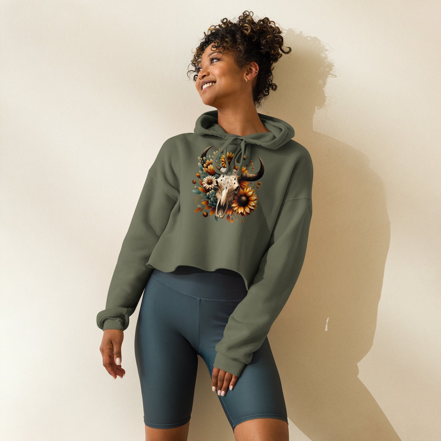 Side view of military green hoodie with western floral skull and succulents