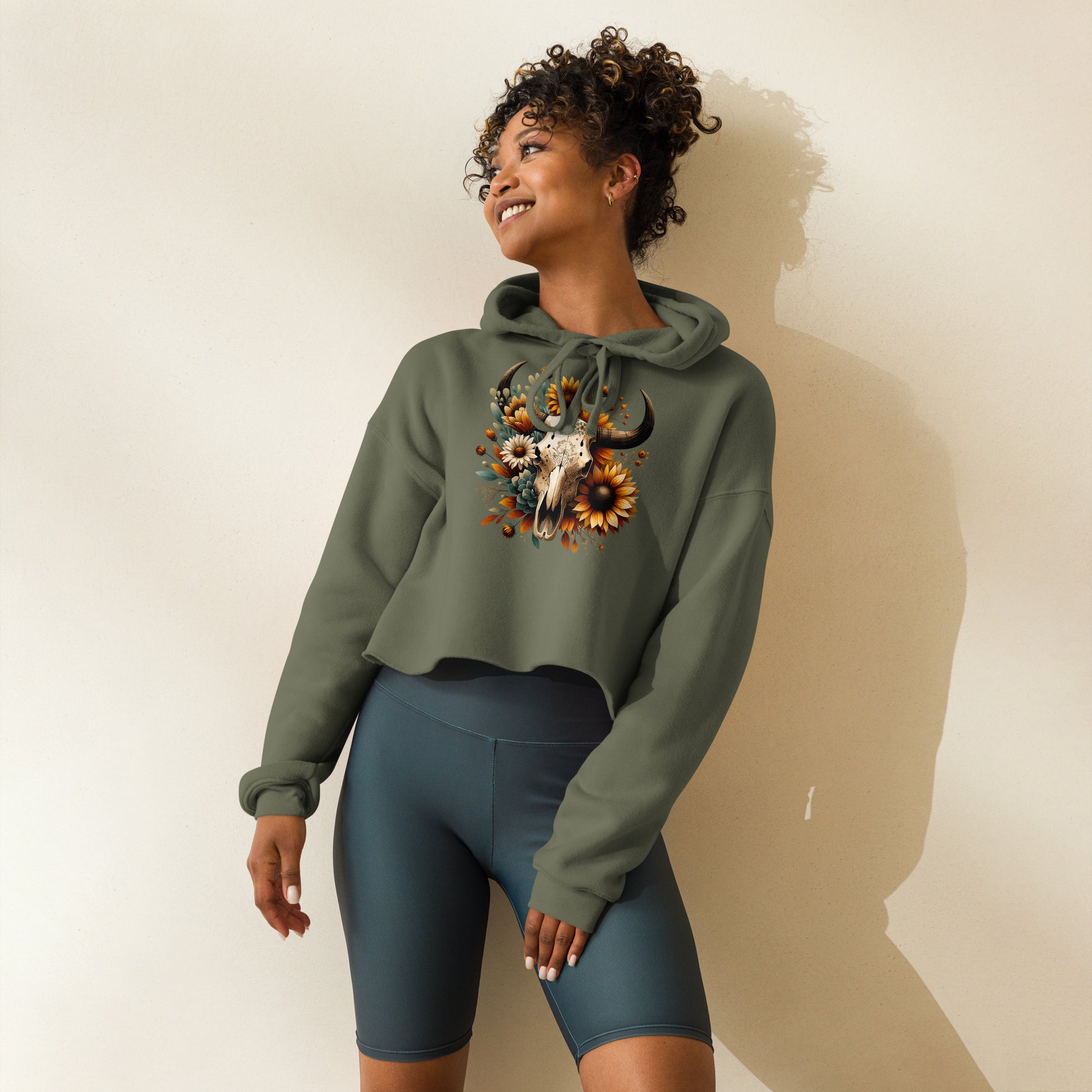 Side view of military green hoodie with western floral skull and succulents