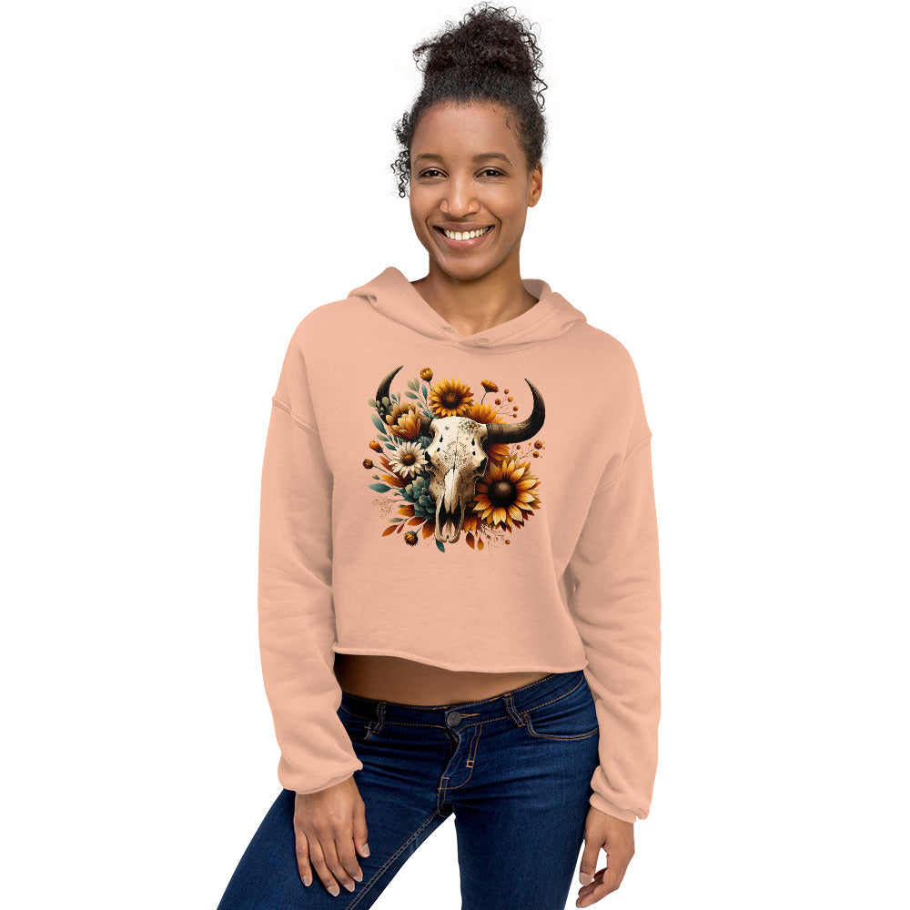 Peach hoodie with bull skull, sunflowers, and succulents – front view on model