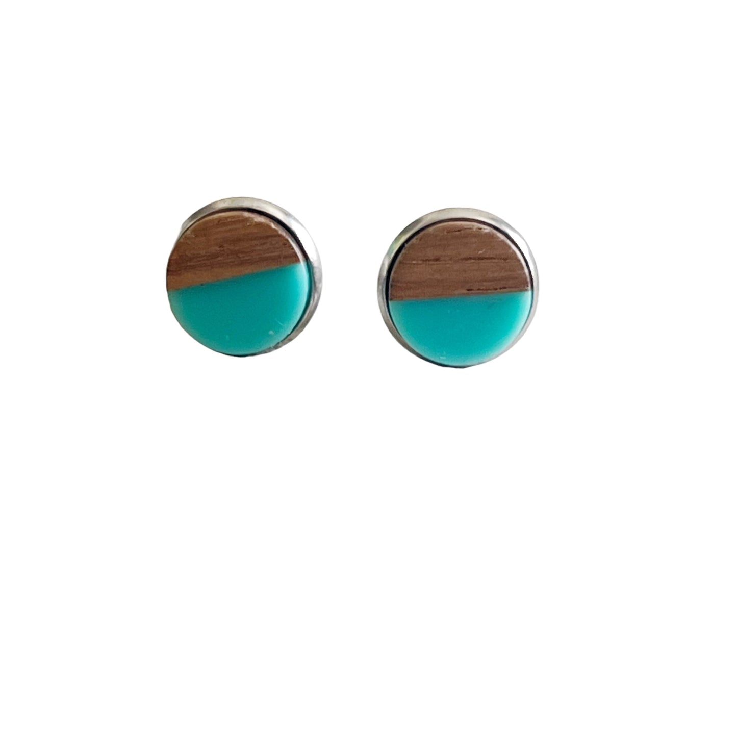 Round teal and wood stud earrings with a glossy resin top displayed on a white background 