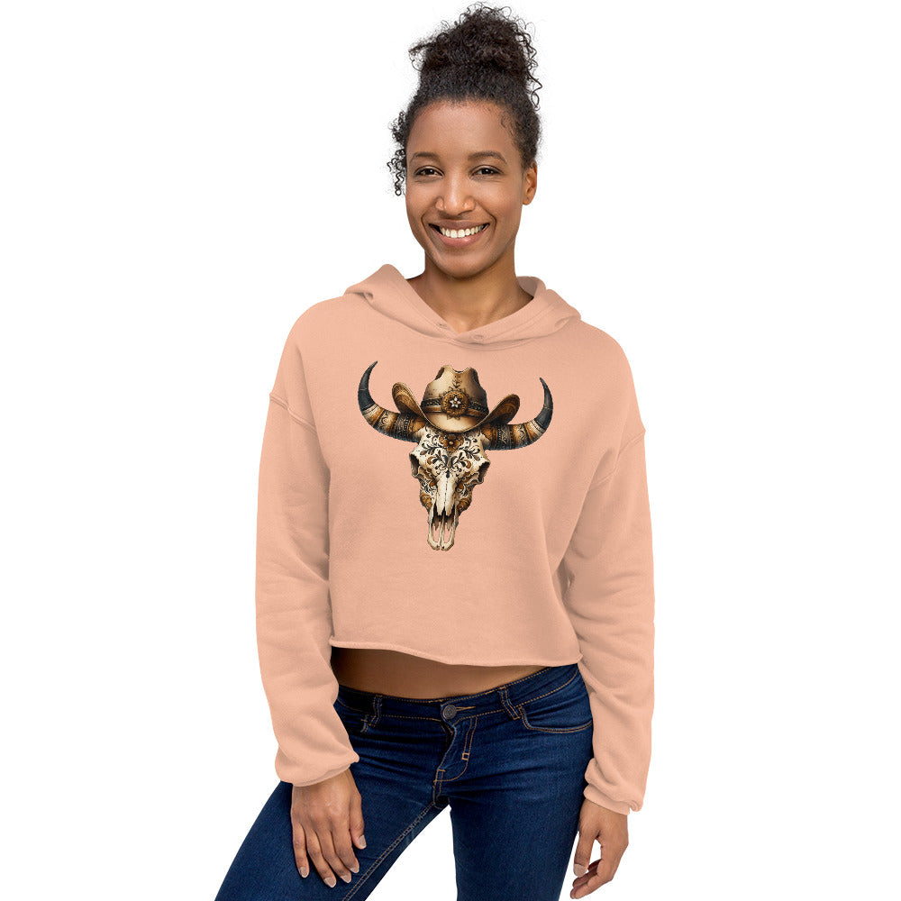 Peach hoodie with ornate bull skull and floral cowgirl hat – front view on model