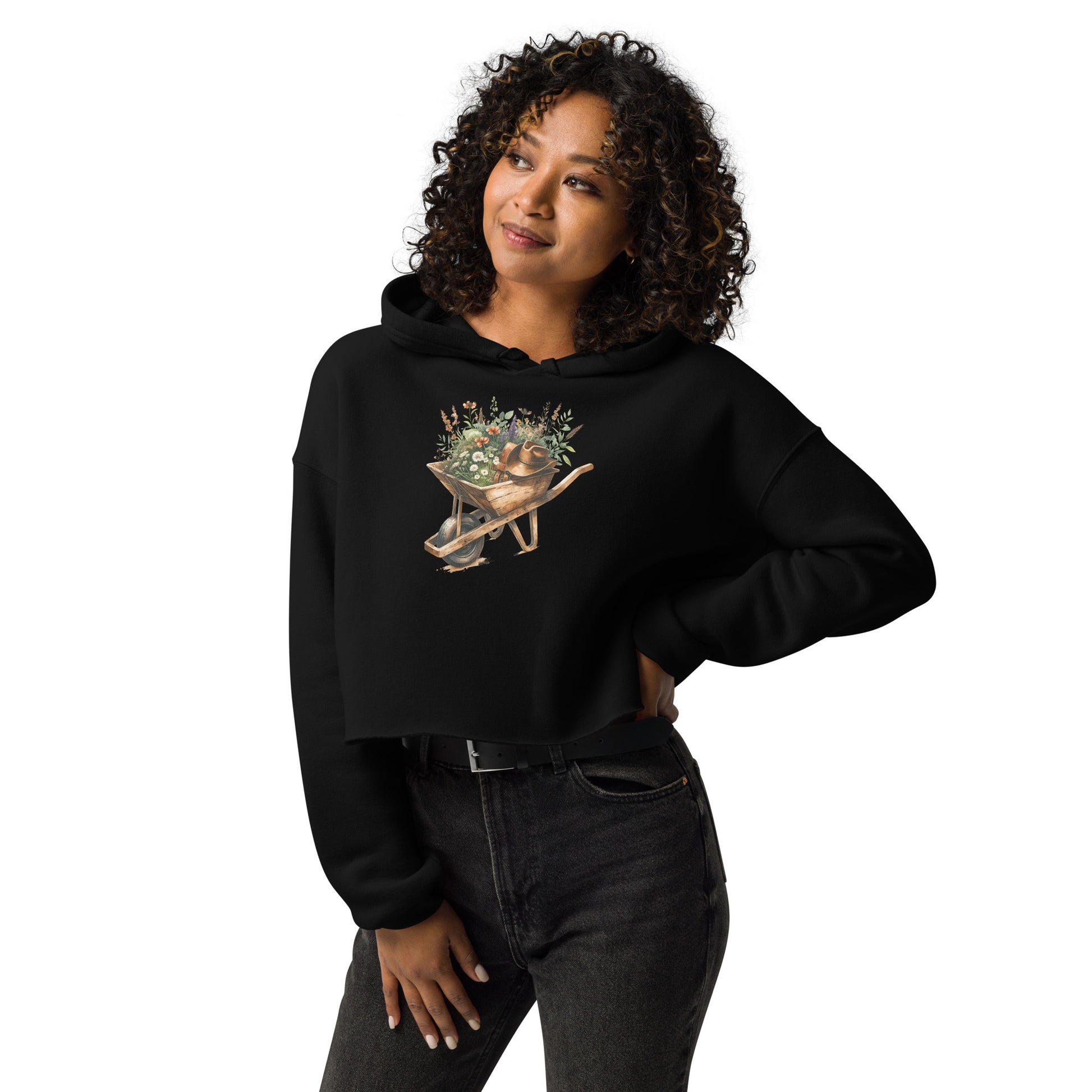 Black crop hoodie with rustic wheelbarrow, wildflowers, and cowgirl hat graphic – front view