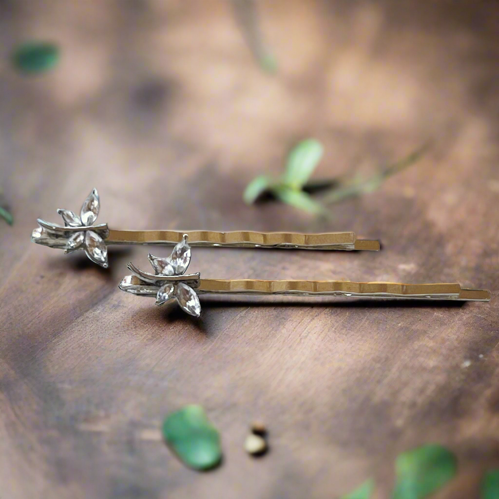 Elegant dragonfly bobby pins styled as whimsical wedding hair accessories