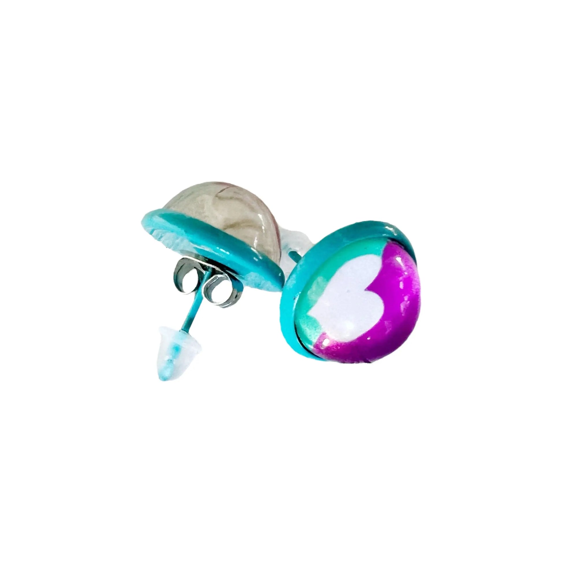 Back side of colorful earrings with a heart design on a white background