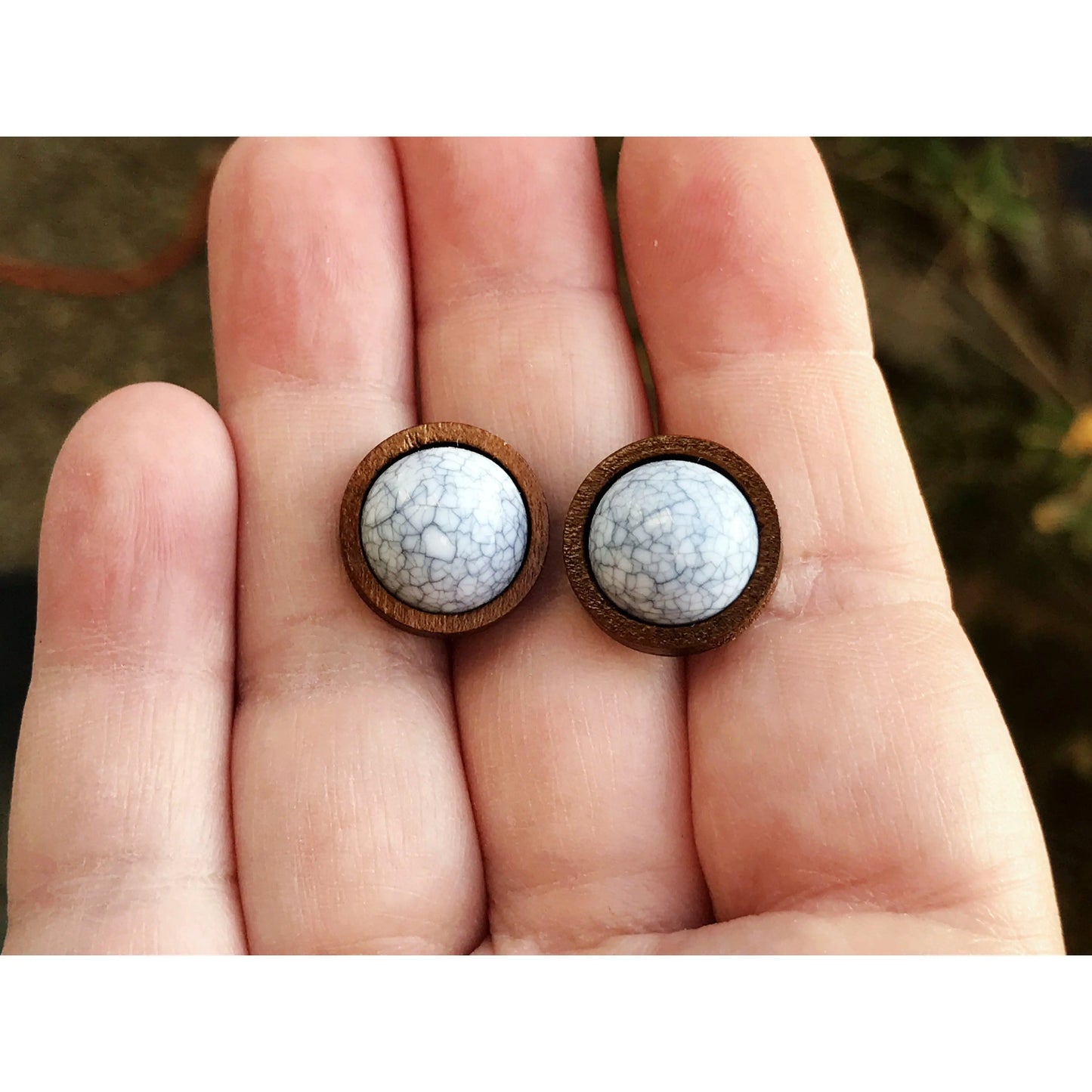 White Stone Wood Stud Earrings -Western Jewelry in hand for scale 
