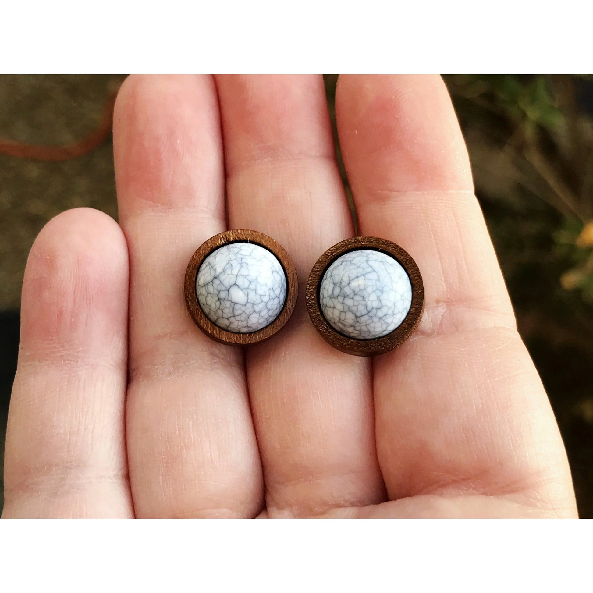 White Stone Wood Stud Earrings -Western Jewelry in hand for scale 
