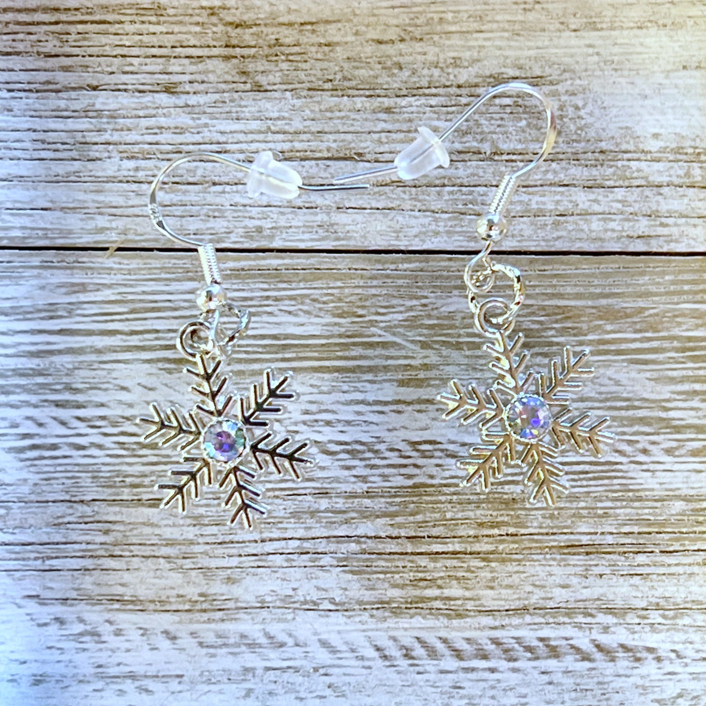 Silver Snowflake Dangle Earrings: Sparkling Rhinestone Accents for Winter Charm