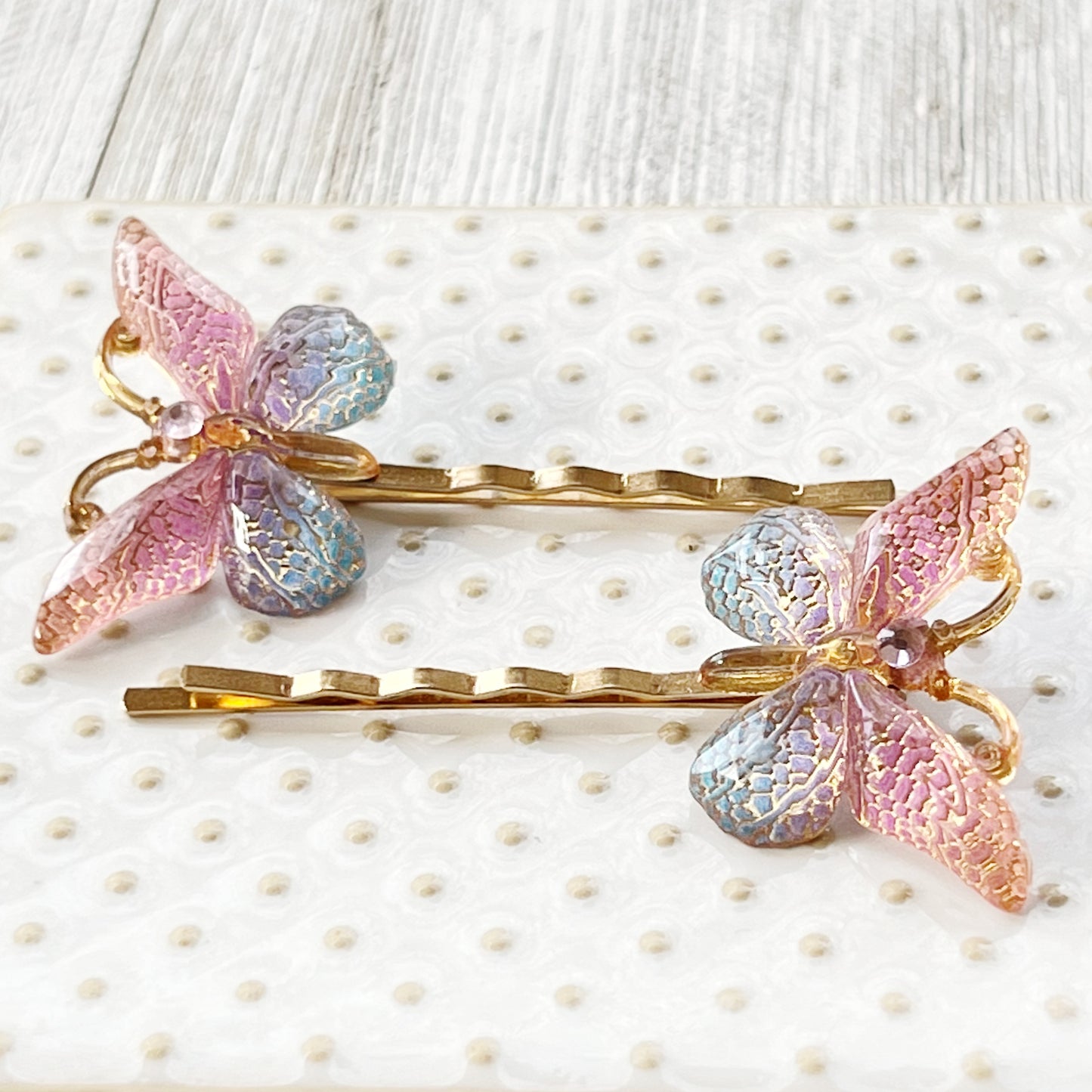 Large Acrylic Butterfly Hair Pins: Vibrant Pink, Blue & Gold tones with Rhinestone Accents for Statement Hairstyles