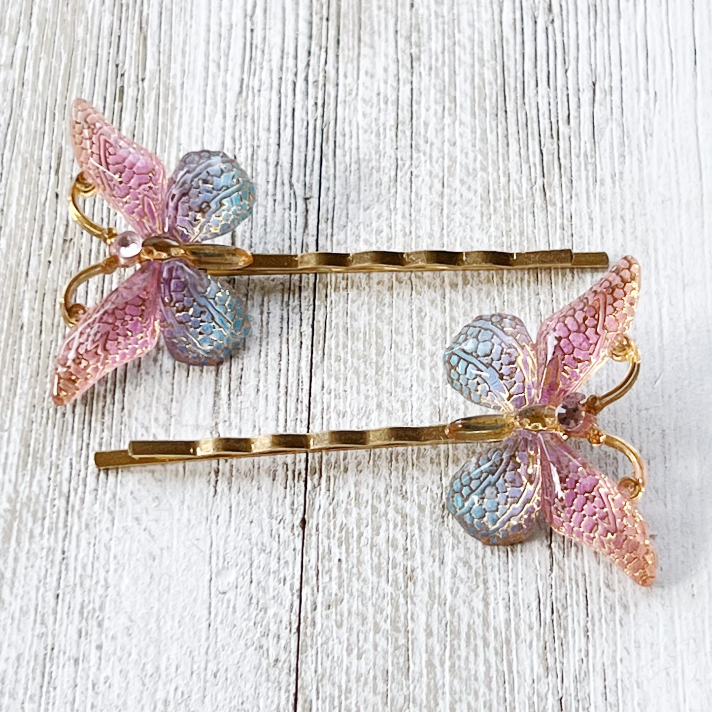 Large Acrylic Butterfly Hair Pins: Vibrant Pink, Blue & Gold tones with Rhinestone Accents for Statement Hairstyles