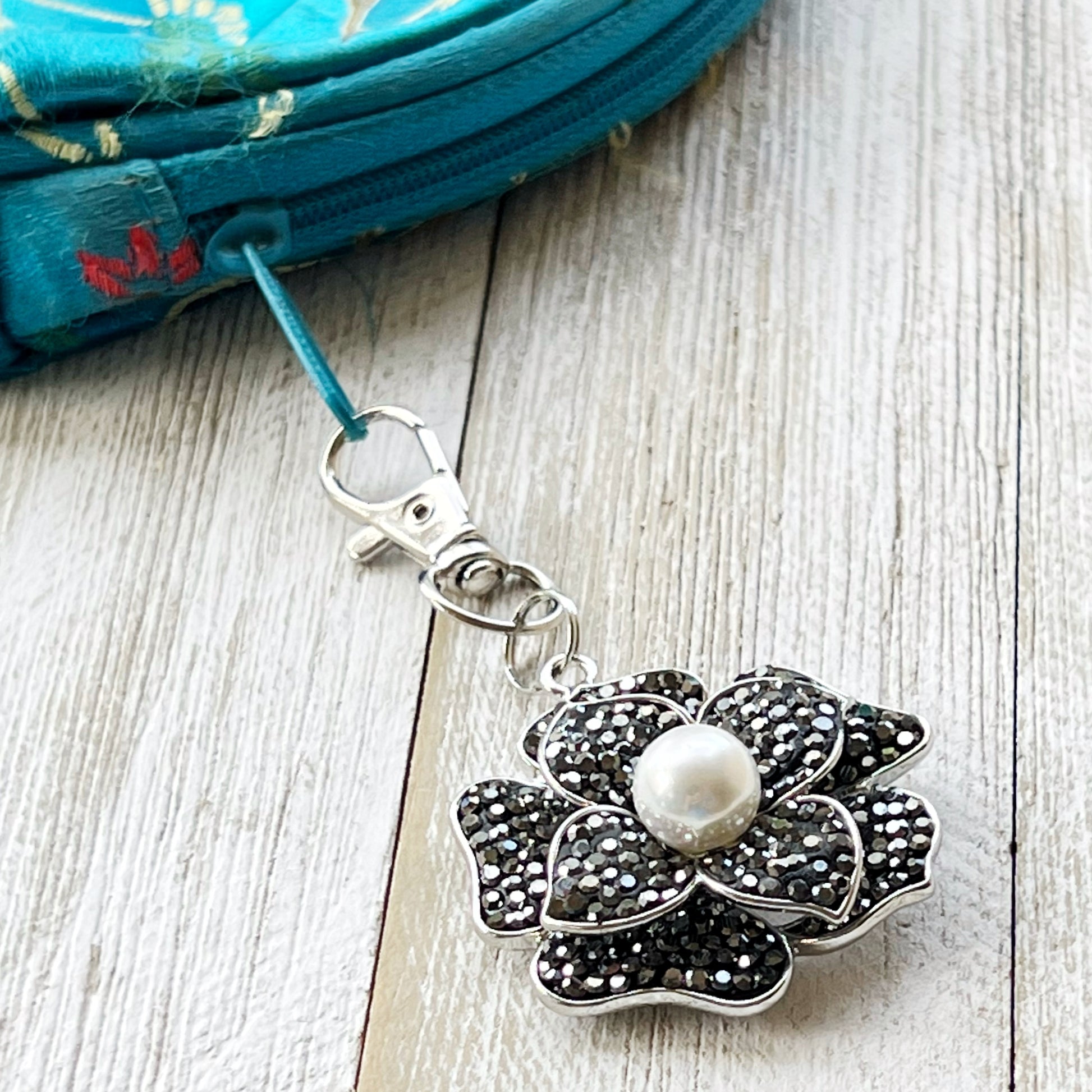 Flower Purse Charm with Rhinestones & Pearl: Elegant Accessory for Your Bag