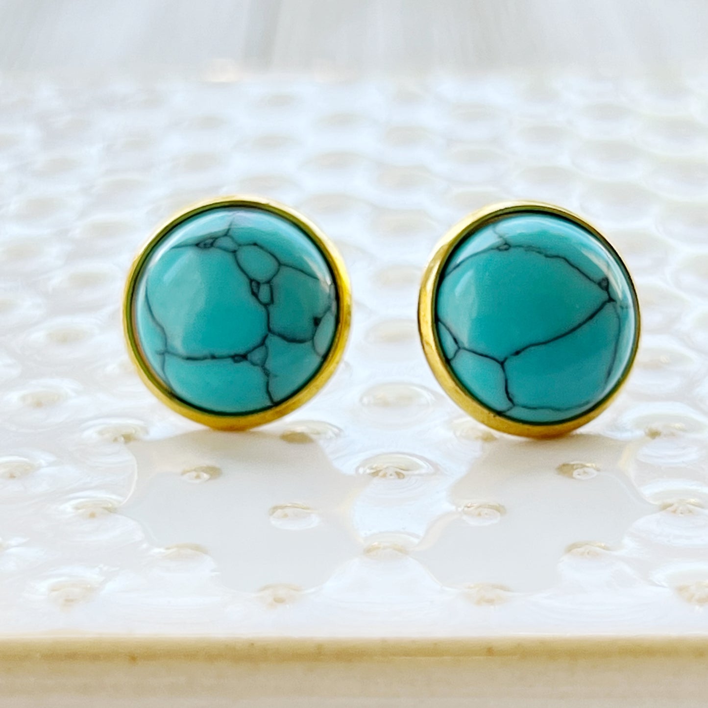 Round turquoise gold stud earrings side view