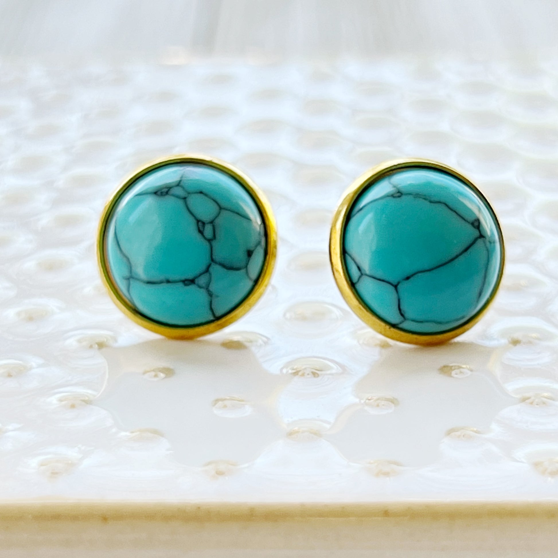 Round turquoise gold stud earrings side view