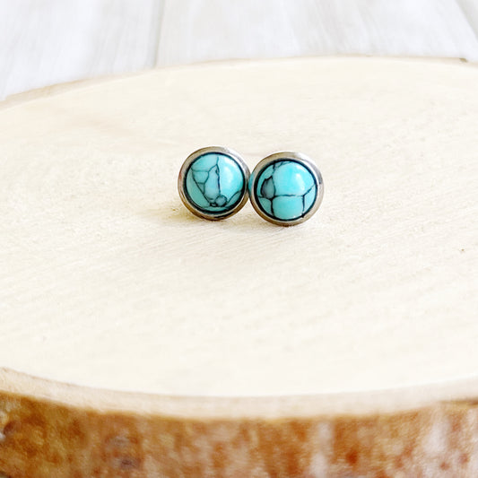 Turquoise Stud Earrings – 6mm Round Silver Boho Western Jewelry on wood slice